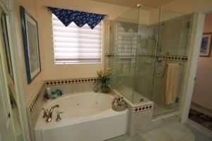 Shower and Bathtub Glass with tile surround shower and jet tub