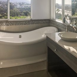 bathroom remodel with large freestanding bathtub