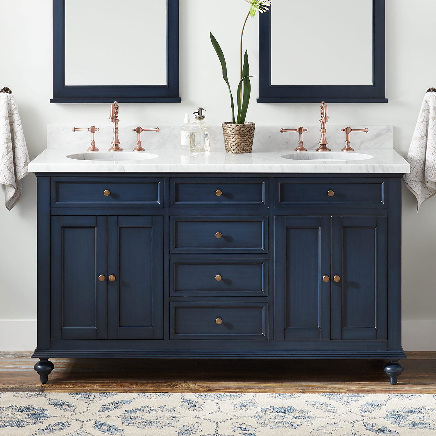 Cabinet knobs and pulls are defining pieces in a bathroom.
